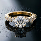 Yellow gold Oval Diamond Solitaire Ring with Shared Prong Round Side Stones_36