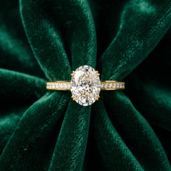 Yellow gold Oval Diamond Solitaire with Pave Band and Six-Prong Setting