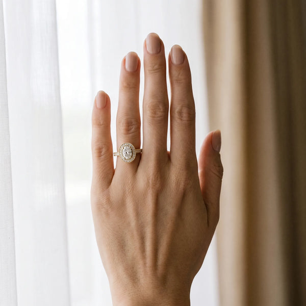 Yellow gold Oval Halo Diamond Engagement Ring with Pave Band and Four-Prong Setting