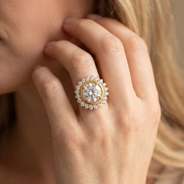Yellow gold Oval Halo Diamond Ring with Milgrain Edge and Round Prong Setting