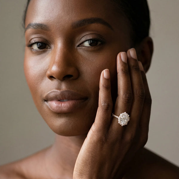 Yellow gold Oval Halo Diamond Ring with Pavé Band and Prong Setting