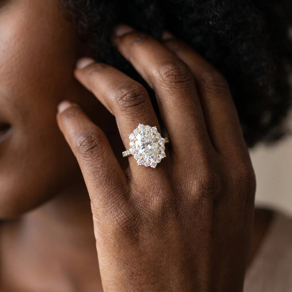 Yellow gold Oval Halo Diamond Ring with Pavé Band and Prong Setting