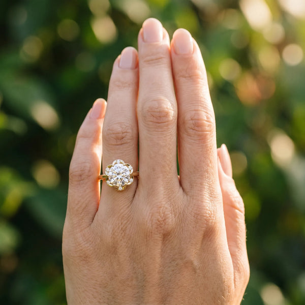 Yellow gold Oval Halo Diamond Ring with Round Cluster Setting, Solitaire Band, and Four-Prong Setting