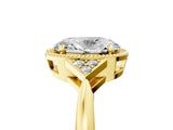 Yellow gold Oval Halo Diamond Ring with Tapered Band and Four-Prong Setting_37