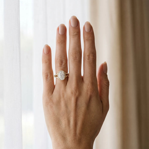 Yellow gold Oval Halo Split Shank Pave Diamond Ring with Four-Prong Setting