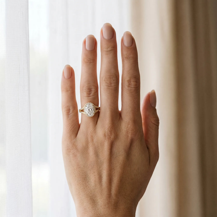 Yellow gold Oval Halo Split Shank Pave Diamond Ring with Four-Prong Setting