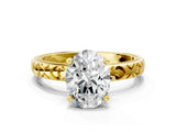 Yellow gold Oval Solitaire Diamond Engagement Ring with XO Engraved Band and Four-Prong Setting