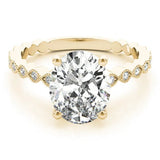 Yellow gold Oval Solitaire Diamond Ring with Infinity Twist Band and Four-Prong Setting 1