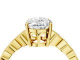 Yellow gold Oval Solitaire Diamond Ring with Infinity Twist Band and Four-Prong Setting_10