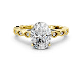 Yellow gold Oval Solitaire Diamond Ring with Infinity Twist Band and Four-Prong Setting_6