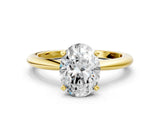 Yellow gold Oval Solitaire Diamond Ring with Six-Prong Setting on a Classic Band