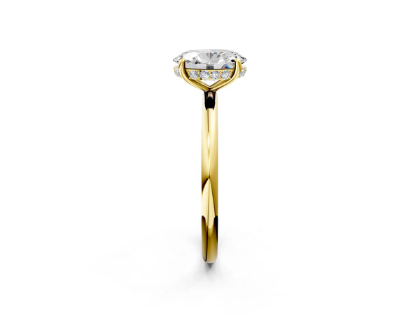 Yellow gold Oval Solitaire Diamond Ring with a Classic Band and Four-Prong Setting