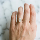 Yellow gold Oval Solitaire Engagement Ring with Cathedral Band and Four-Prong Setting_56