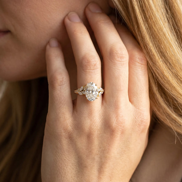 Yellow gold Oval Solitaire Marquise Twist Band with Six-Prong Setting