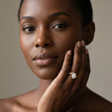 Yellow gold Oval Solitaire Twist Band with Pave Set Diamonds and Four-Prong Setting_176