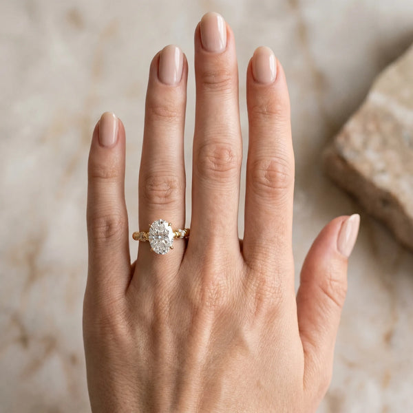 Yellow gold Oval Solitaire Twisted Band Prong Set Engagement Ring