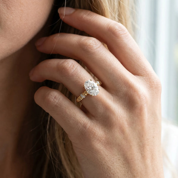 Yellow gold Oval Solitaire Twisted Band Prong Set Engagement Ring