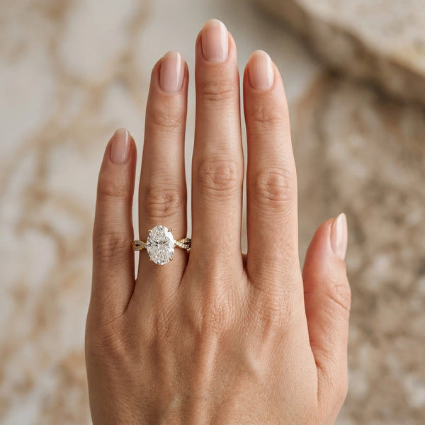 Yellow gold Oval Solitaire Twisted Pave Band with Four-Prong Setting