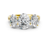 Yellow gold Oval Three-Stone Diamond Ring with Prong Setting on a Classic Band_16