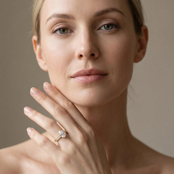 Yellow gold Pear Brilliant Cut Diamond Engagement Ring with Pavé Band and Four-Prong Setting