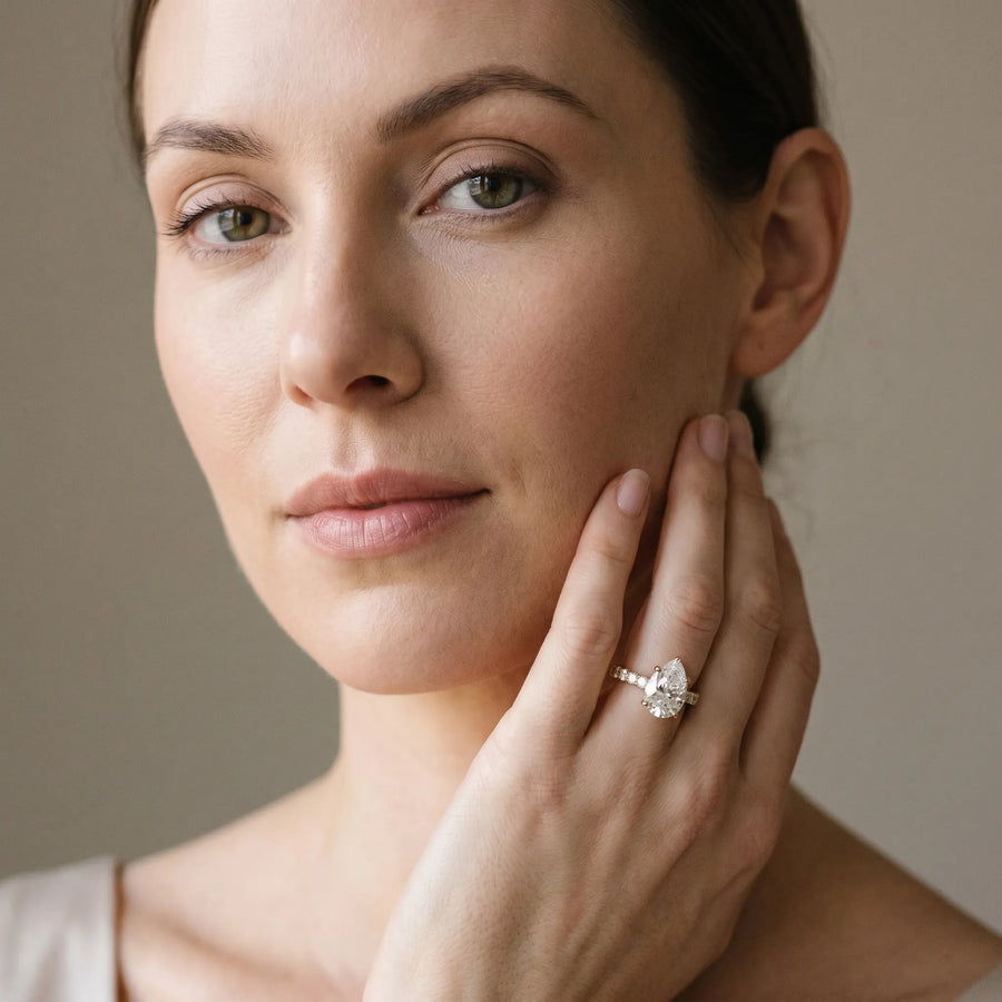 Yellow gold Pear Brilliant Diamond Pavé Band with Six-Prong Setting