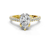 Yellow gold Pear Brilliant Diamond Solitaire with Pavé Band and Four-Prong Setting