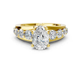 Yellow gold Pear Brilliant Solitaire with Side Stones on a Pave Band and Four-Prong Setting_24