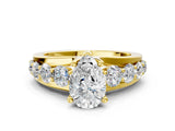 Yellow gold Pear Brilliant Solitaire with Side Stones on a Pave Band and Four-Prong Setting_62