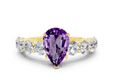 Yellow gold Pear Cut Amethyst Prong Setting with Side Stones on a Pave Band