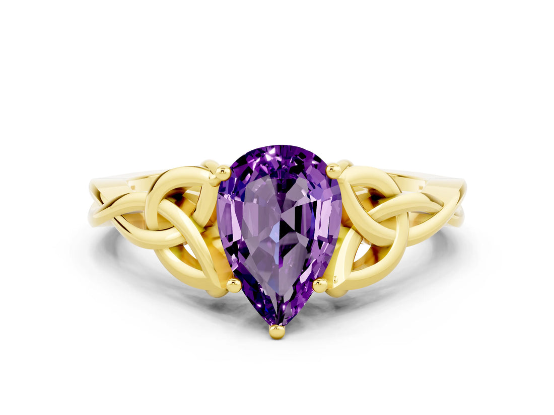 Yellow gold Pear Cut Amethyst Solitaire Engagement Ring with Celtic Knot Band and Four-Prong Setting