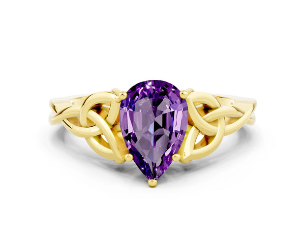 Yellow gold Pear Cut Amethyst Solitaire Engagement Ring with Celtic Knot Band and Four-Prong Setting