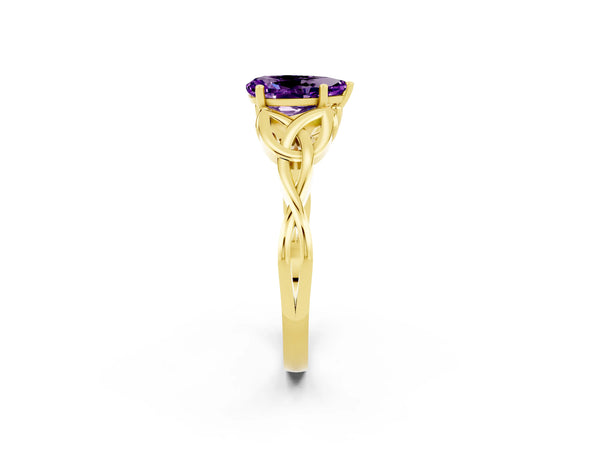 Yellow gold Pear Cut Amethyst Solitaire Engagement Ring with Celtic Knot Band and Four-Prong Setting
