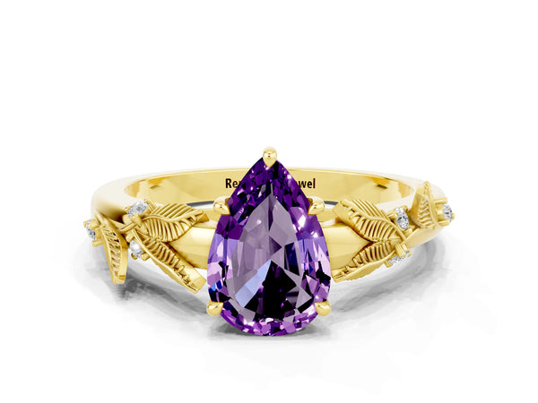 Yellow gold Pear Cut Amethyst Solitaire Ring with Leaf Motif Band and Four-Prong Setting