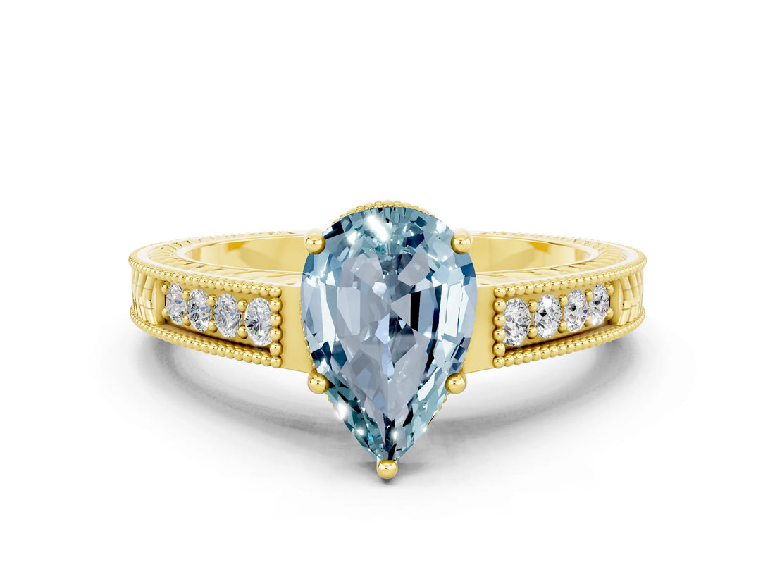 Yellow gold Pear Cut Aquamarine Engagement Ring with Milgrain Channel Set Band and Prong Setting