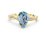 Yellow gold Pear Cut Aquamarine Engagement Ring with Side Stone Accents and Four-Prong Setting_84