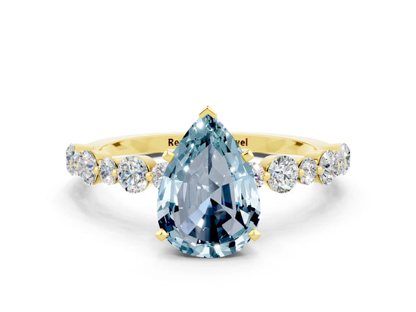 Yellow gold Pear Cut Aquamarine Prong Set Engagement Ring with Pavé Band