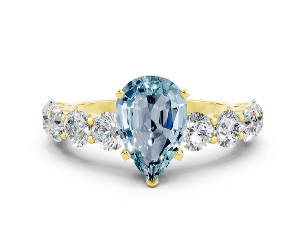 Yellow gold Pear Cut Aquamarine Prong Setting with Side Stones on a Pave Band
