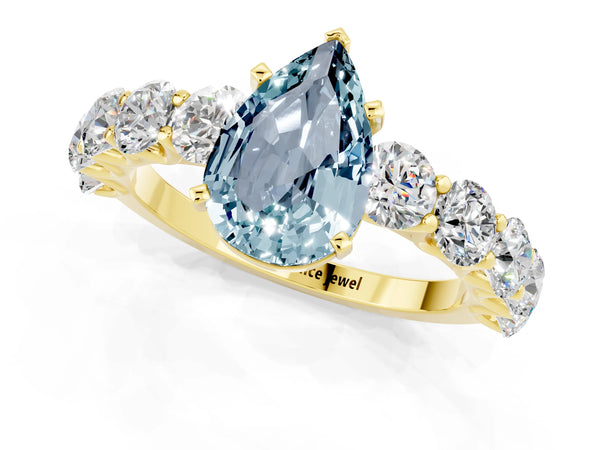 Yellow gold Pear Cut Aquamarine Prong Setting with Side Stones on a Pave Band