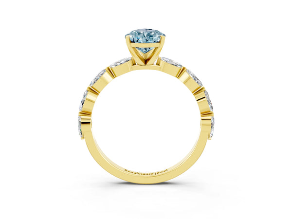 Yellow gold Pear Cut Aquamarine Ring with Marquise Side Stones and Prong Setting