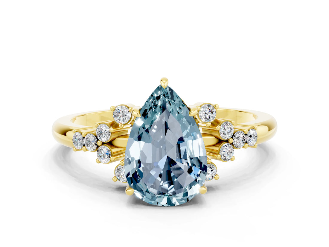 Yellow gold Pear Cut Aquamarine Ring with Side Stones and Four-Prong Setting_36