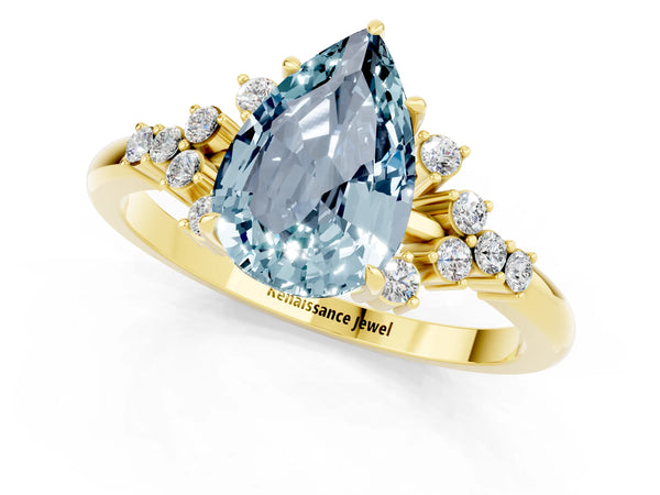 Yellow gold Pear Cut Aquamarine Ring with Side Stones and Four-Prong Setting