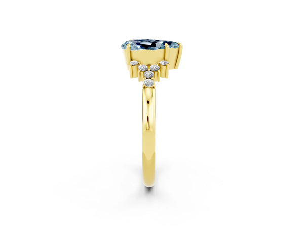 Yellow gold Pear Cut Aquamarine Ring with Side Stones and Four-Prong Setting