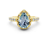 Yellow gold Pear Cut Aquamarine Scalloped Halo Engagement Ring with Round Shared Prong Band_24