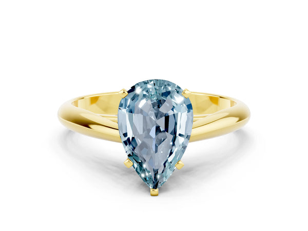 Yellow gold Pear Cut Aquamarine Solitaire Engagement Ring with Cathedral Setting and Four-Prong Mount