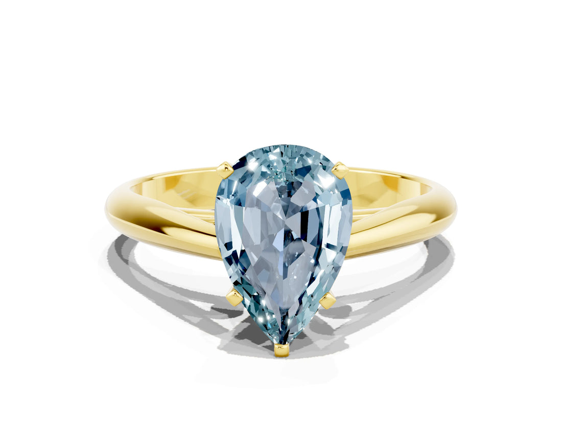 Yellow gold Pear Cut Aquamarine Solitaire Engagement Ring with Cathedral Setting and Four-Prong Mount_84