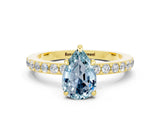 Yellow gold Pear Cut Aquamarine Solitaire Engagement Ring with Pavé Band and Four-Prong Setting