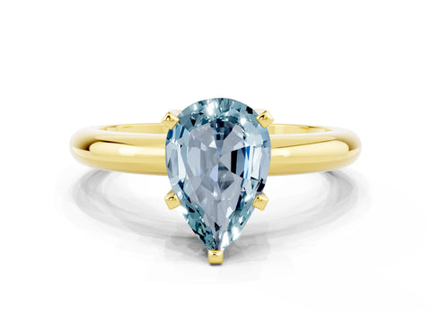 Yellow gold Pear Cut Aquamarine Solitaire Engagement Ring with Round Band and Four-Prong Setting