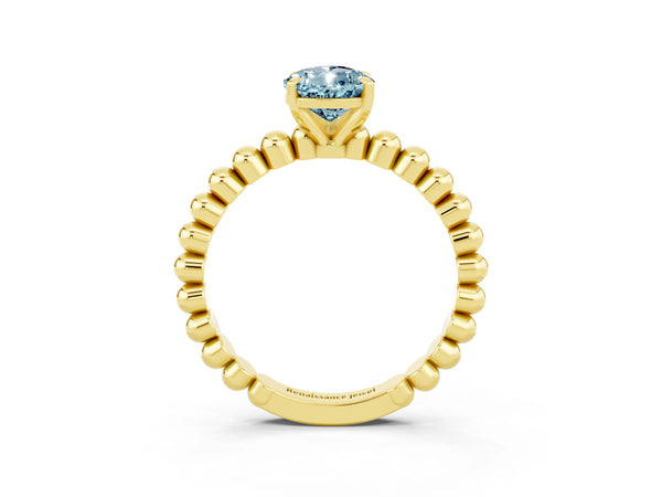 Yellow gold Pear Cut Aquamarine Solitaire Ring with Beaded Band and Prong Setting