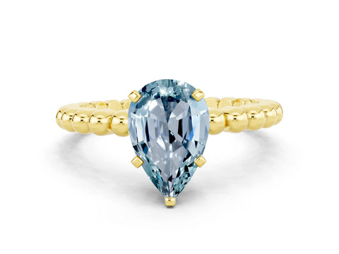 Yellow gold Pear Cut Aquamarine Solitaire Ring with Beaded Band and Prong Setting