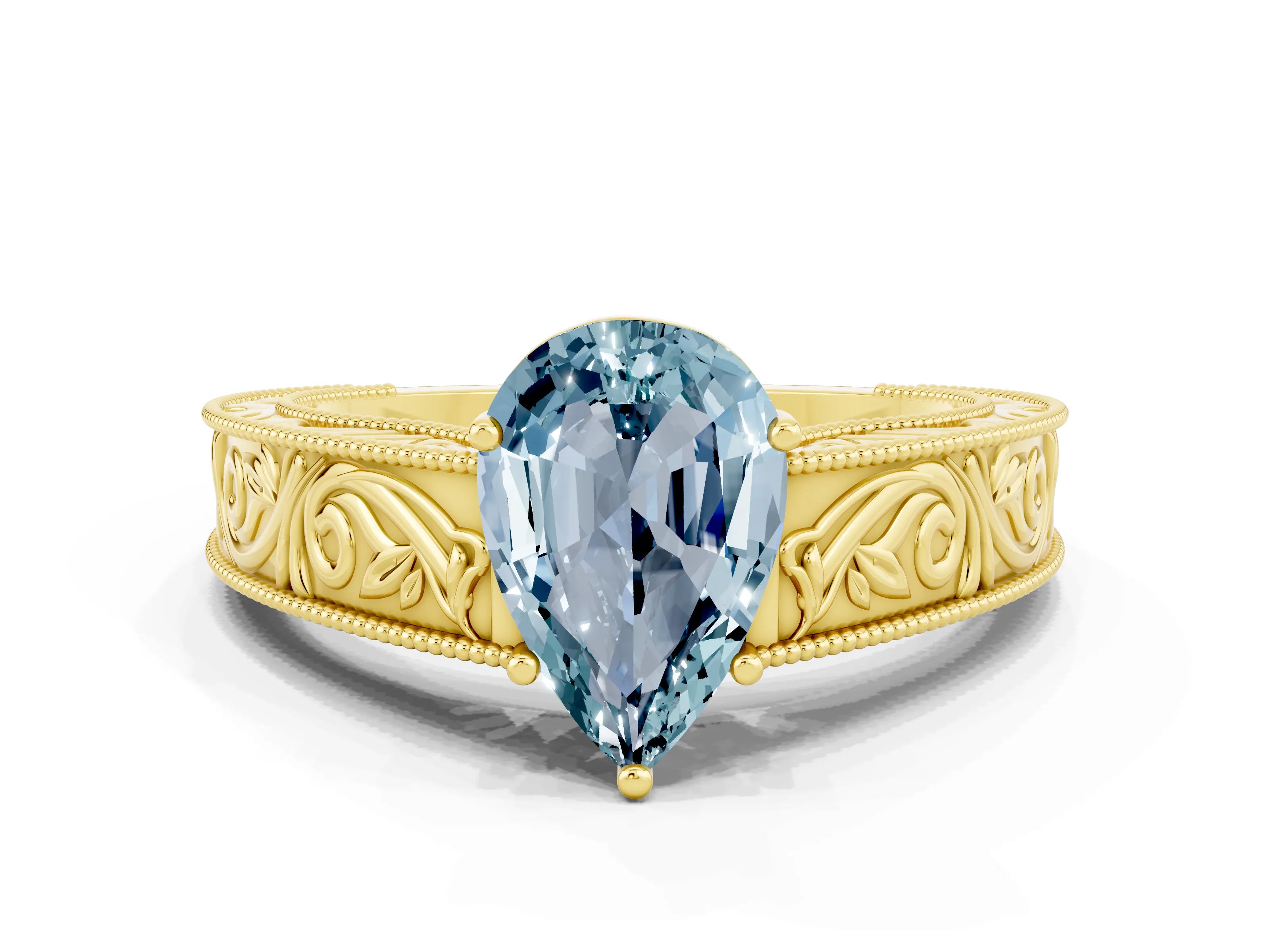 Yellow gold Pear Cut Aquamarine Solitaire Ring with Engraved Band and Four-Prong Setting
